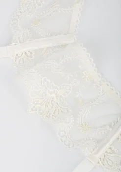 Pas do pończoch z haftowanej koronki w kolorze off white Nilla Poupee Marilyn